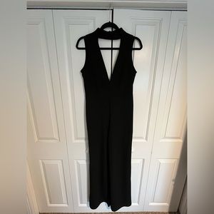 Deep neckline black sleeveless jumpsuit
